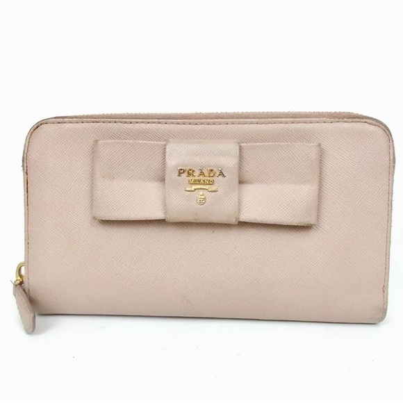 Prada Handbags - Prada Continental Zip Around Wallet Saffiano Leather Beige Bow Gold Hardware